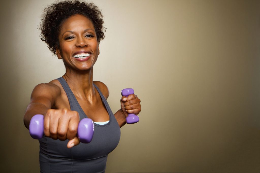 Woman working out with hand weights